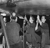 Riveting wings on the B-24